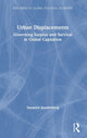 Book cover of: Urban Displacements. By: Susanne Soederberg
