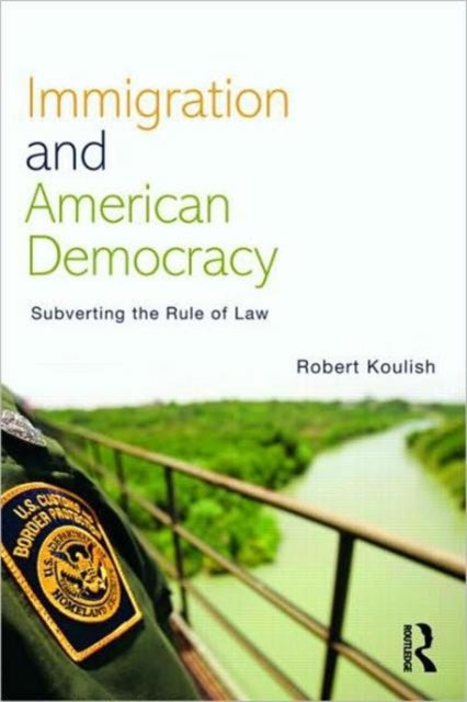 Book cover of: Immigration and American Democracy. By: Robert E. Koulish