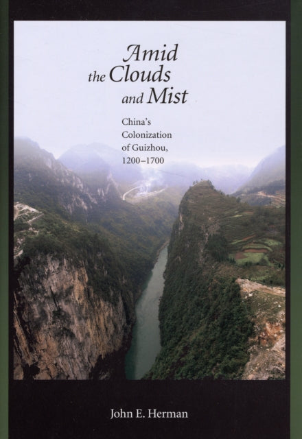 Book cover of: Amid the Clouds and Mist. By: John E. Herman