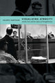 Book cover of: Visualizing Atrocity. By: Valerie Hartouni