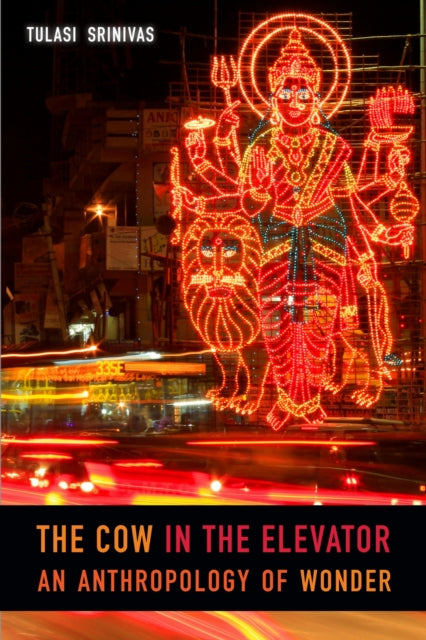 Book cover of: Cow in the Elevator. By: Tulasi Srinivas