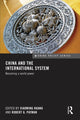 Book cover of: China and the International System. By: Xiaoming Huang