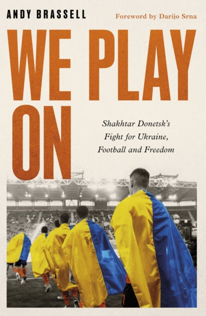 Book cover of: We Play On. By: Andy Brassell