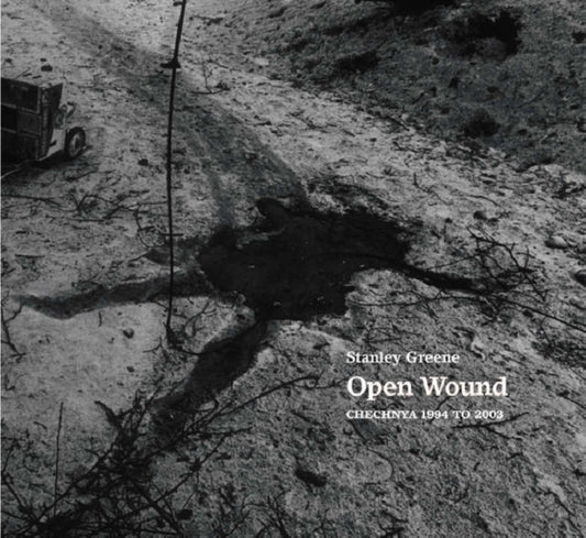 Book cover of: Stanley Greene: Open Wound. By: André Glucksmann
