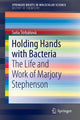Book cover of: Holding Hands with Bacteria. By: So a Trba Ova