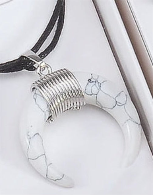 Book cover of: Amulet Pendant - White Magnesite